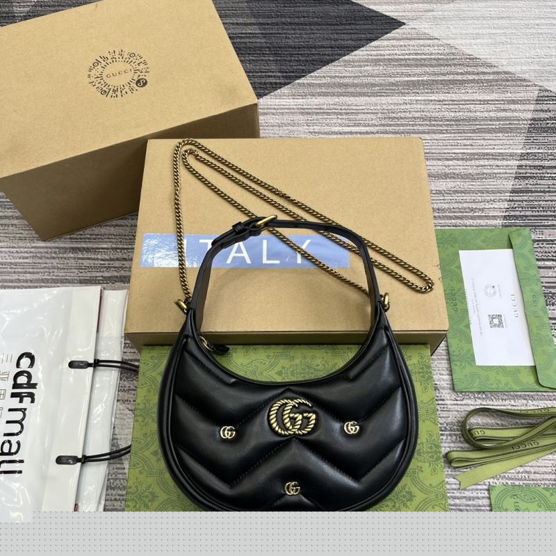 G*u*i top handle bags